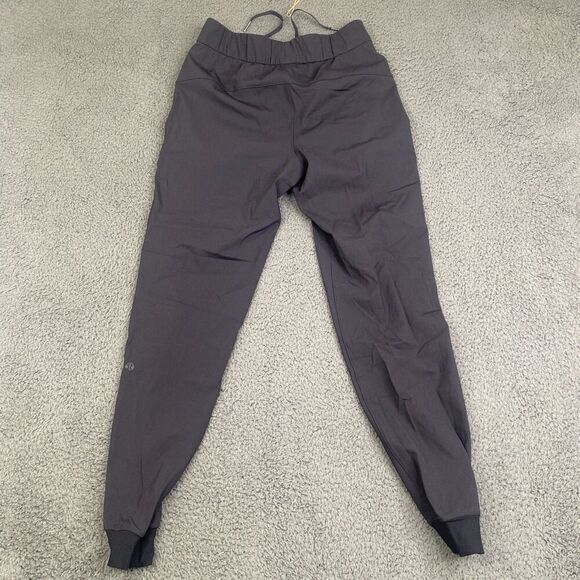 Lululemon On The Fly Jogger Pants Black Size 2 Drawstring Logo LW5cpjs - Picture 8 of 9